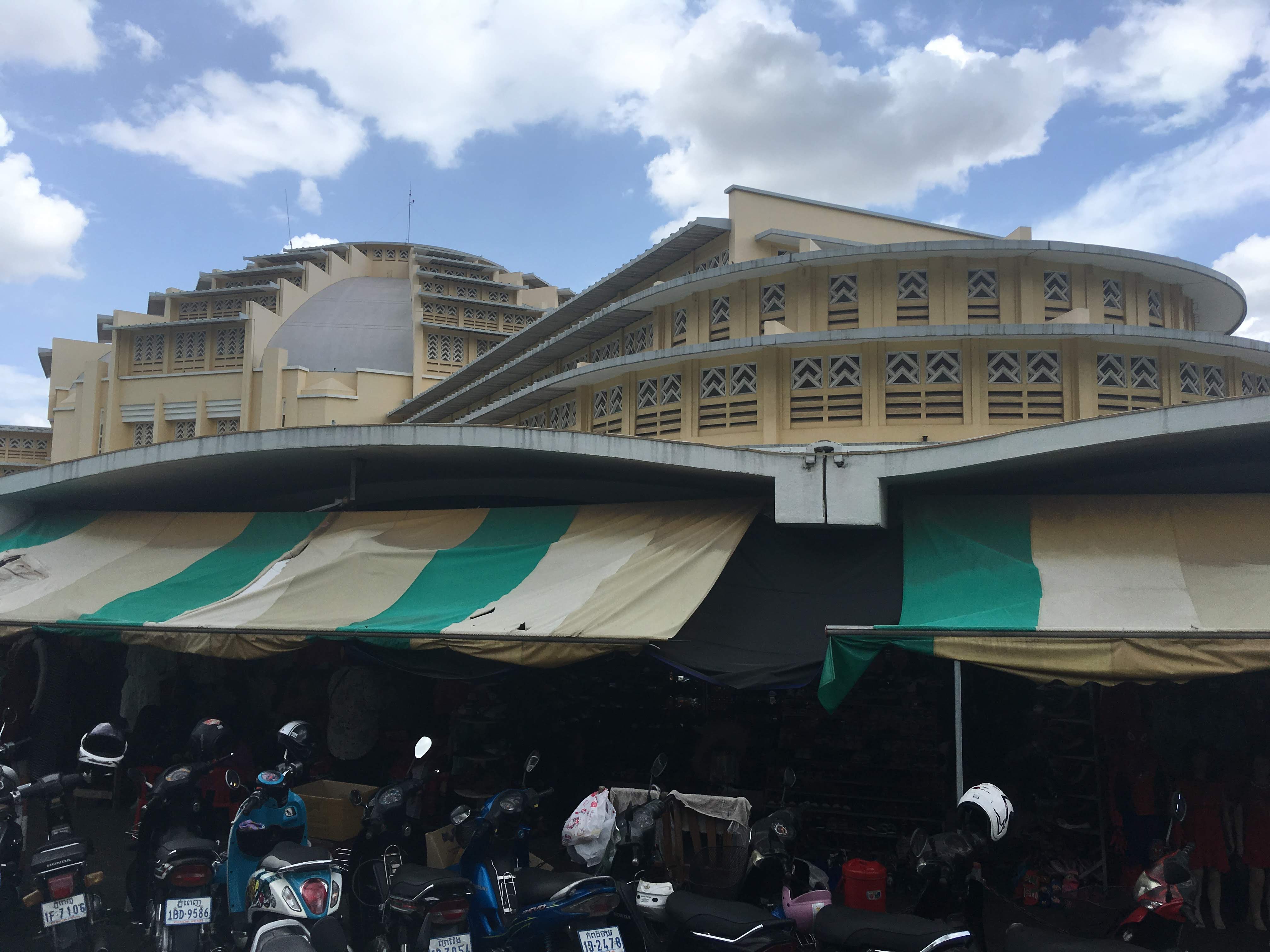Central Market building and parked motorbikes in Phnom Penh