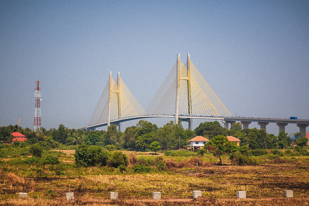 Neak Loeung Bridge and its yellow cables above the Mekong landscape